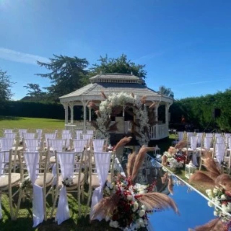An Outisde Ceremony set up at London Chigwell Prince Regent Hotel