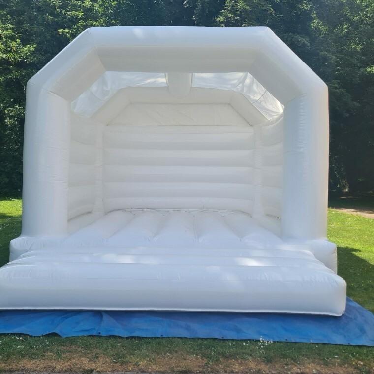 “A stylish all-white bouncy castle that adds elegance and excitement to your celebration — perfect for weddings, parties, and picture-perfect fun