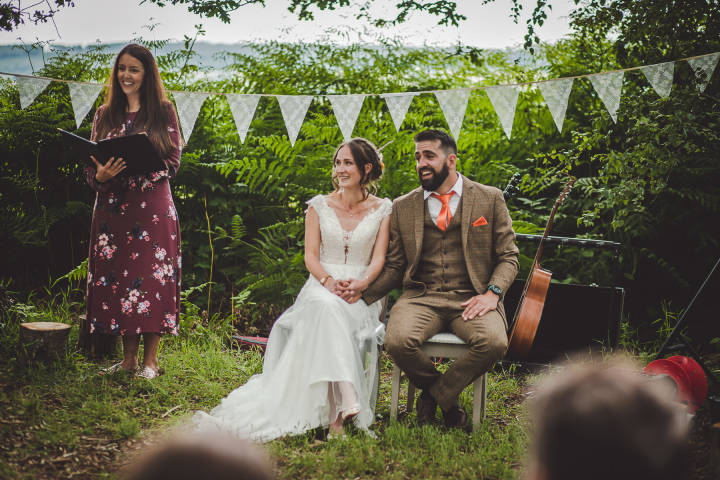 Celebrant Caroline with bride and groom at glamping wedding