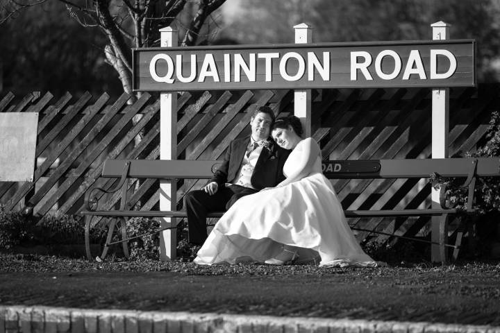 Bride and groom on the platform at the Bucks Railway Centre wedding venue. Unique wedding photograph