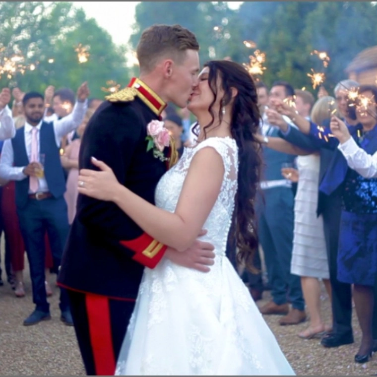 wedding couple with guests being filmed by CKS Productions