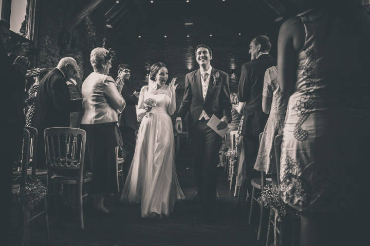 Bride and Groom Walking down the aisle
