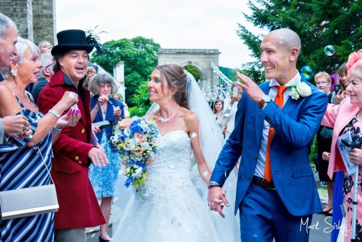 Confetti aisle at All Saint’s Church wedding in Marlow, Buckinghamshire