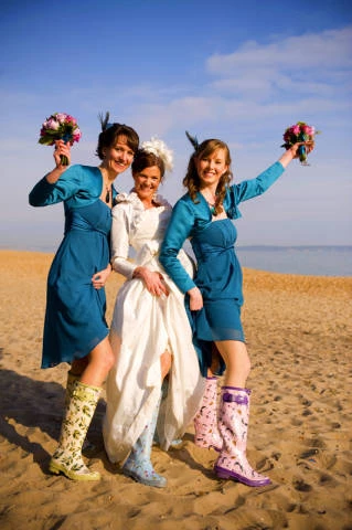 Martin Lewis Photographer beach wedding photos Martin Lewis Photographer bride bridesmaids sandy bea