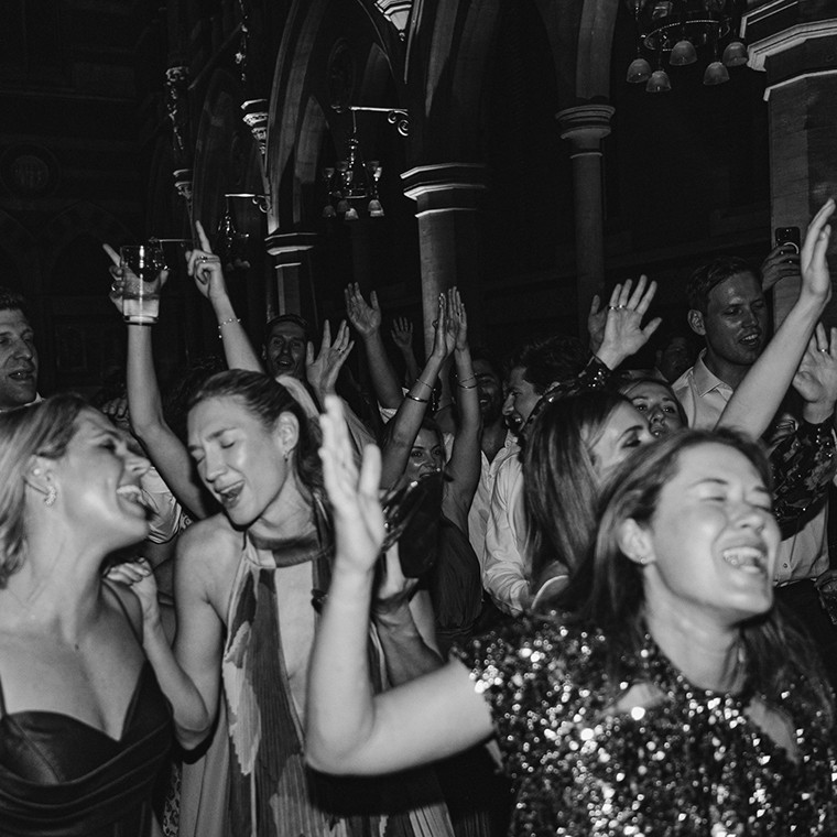 black and white photography of People Partying on the dance floor at Grand Junction Venue in London
