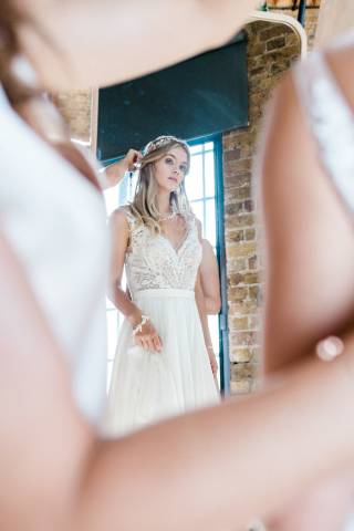 Artistic wedding photography of bride getting ready for Hackney wedding