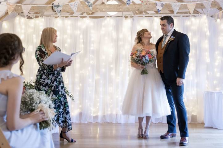 Celebrant Lisa with bride and groom at The Green