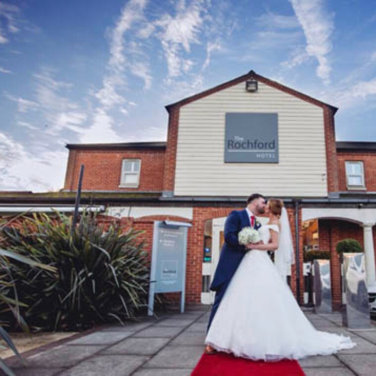 Wedding Couple outside The Rochford Hotel on their wedding day