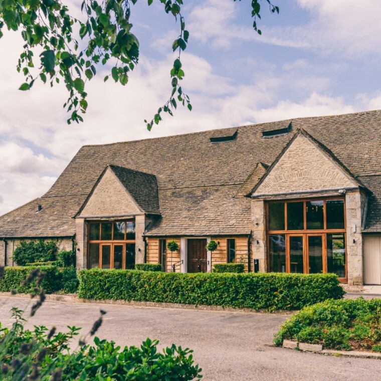 Cotswold stone barn in countryside wedding and events venue