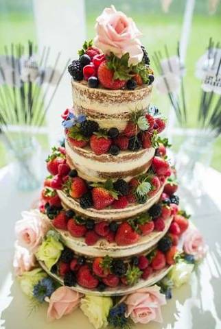Naked wedding cake with fruit & flowers