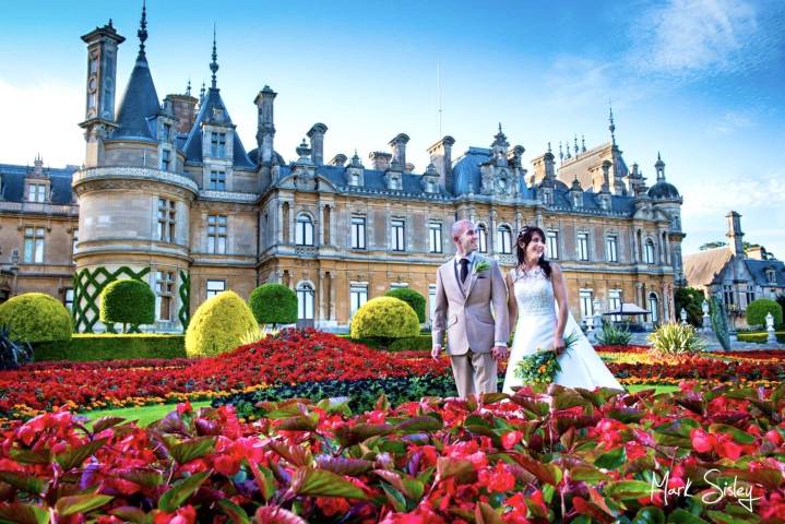 Bride and groom in the gardens at Waddesdon Manor