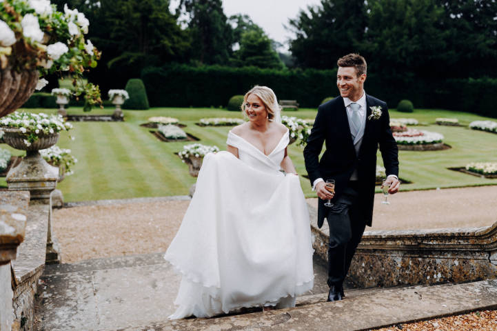 Couple Walking Up Stairs of Garden in Grittleton House, Venues in Chippenham, Wiltshire