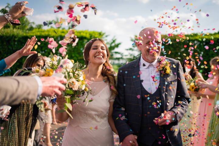Bride and groom confetti shot