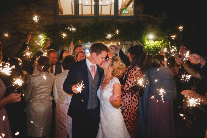 The Great Barn, barn wedding venue Oxfordshire - sparklers, first kiss