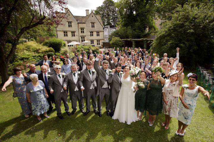 Group wedding photo outside Gloucestershire wedding venue