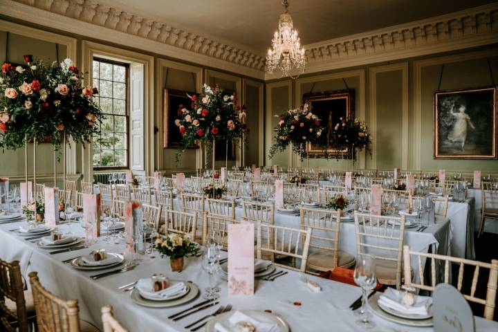 Wedding breakfast set up with long tables 