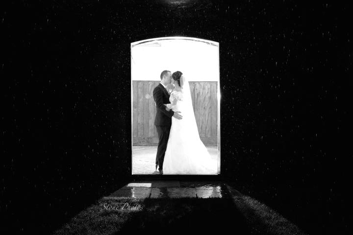 Stone Photos Wedding Photographer in Berkshire, Buckinghamshire, Surrey, Bride, Relaxed, natural, candid, Groom, Love, Couple, Portraits, night shot, winter, dark, rain