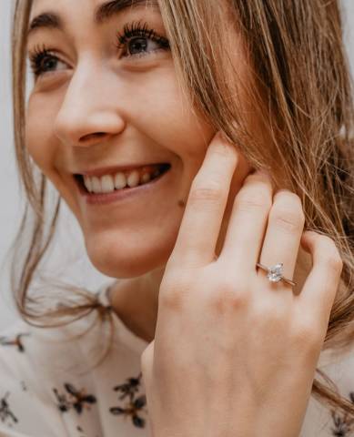 Ali ring: features a classic court band, pear cut centre stone on 3 prongs