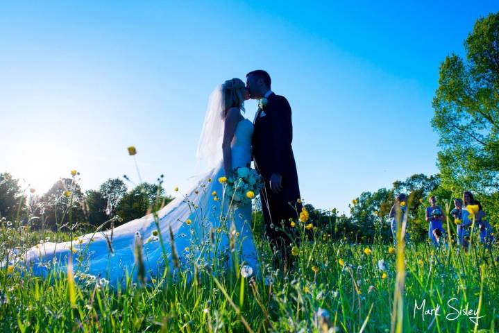Buckinghamshire wedding couple in wild flower field
