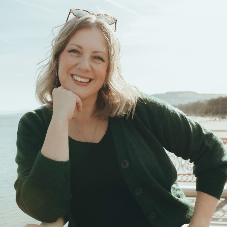 Kate Rostance Wedding Celebrant smiling on Colwyn Bay pier