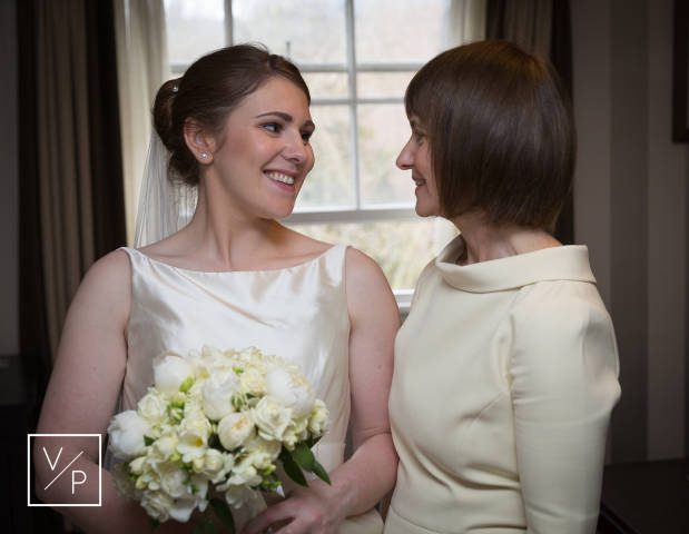 Proud Mum before the ceremony. Photography and videography by Veiled Productions.