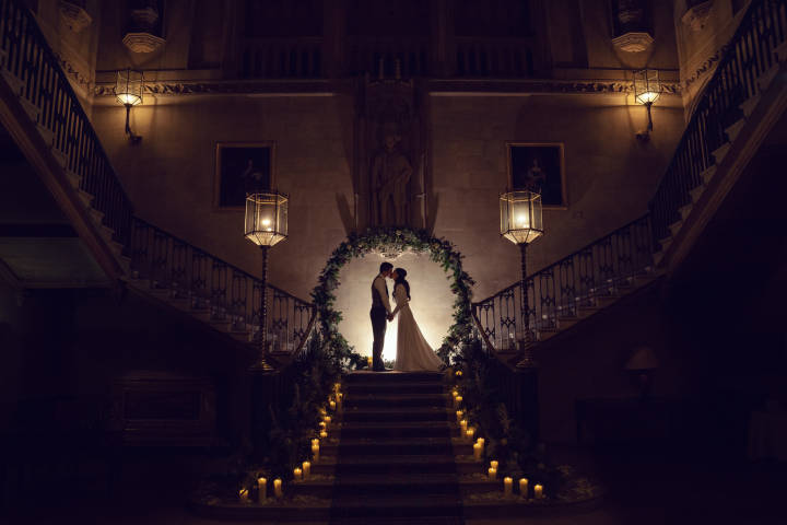 A Main Hall Wedding at Ashridge House. Moon gate, flowers and candles by Rebecca Marsala Weddings