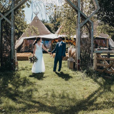 Wedding arch at Sheepdrove with Forest Edge Tipis Marquees in Berkshire