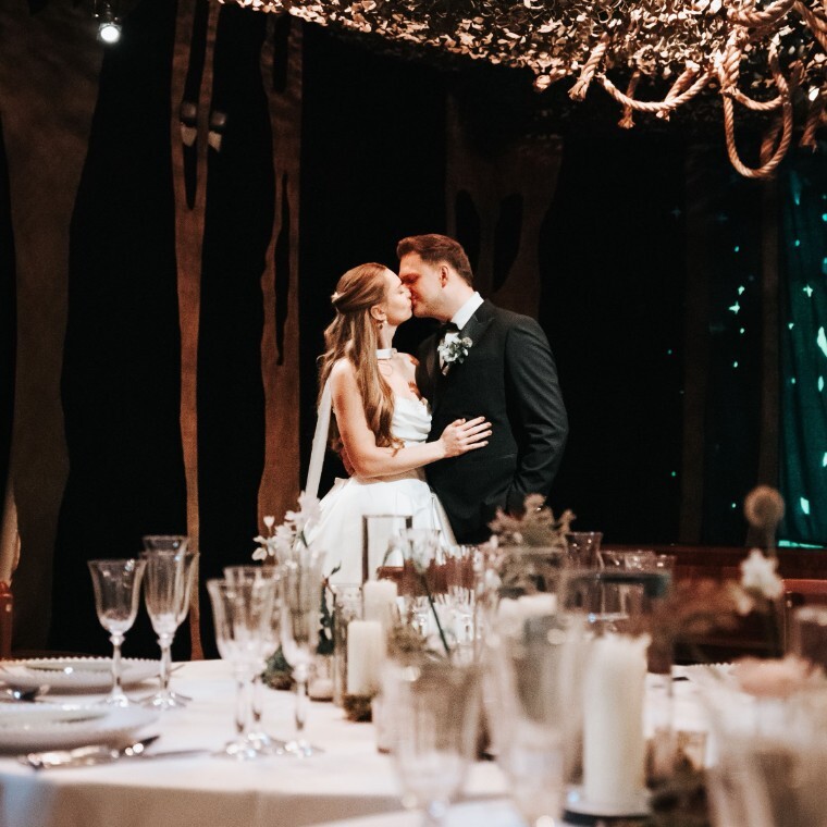 Bride and Groom in Quirky Oxford wedding venue, The Story Museum, in The Whispering Woods a magical woodland dining space