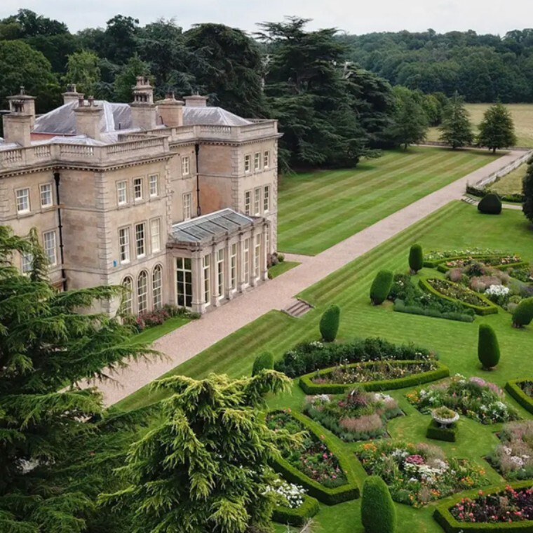Exterior view of Prestwold Hall and the gardens