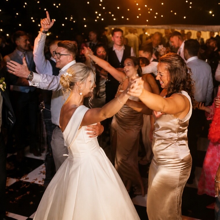 Guests dancing at a wedding