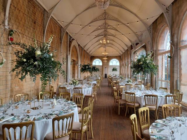 Orangery Wedding Set Up with Golden Chairs in Grittleton House, Venues in Chippenham, Wiltshire