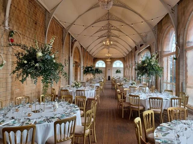 Orangery Wedding Set Up with Golden Chairs in Grittleton House, Venues in Chippenham, Wiltshire