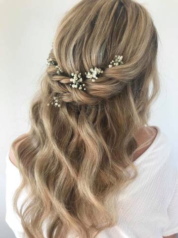 half up half down wavy hair with flowers