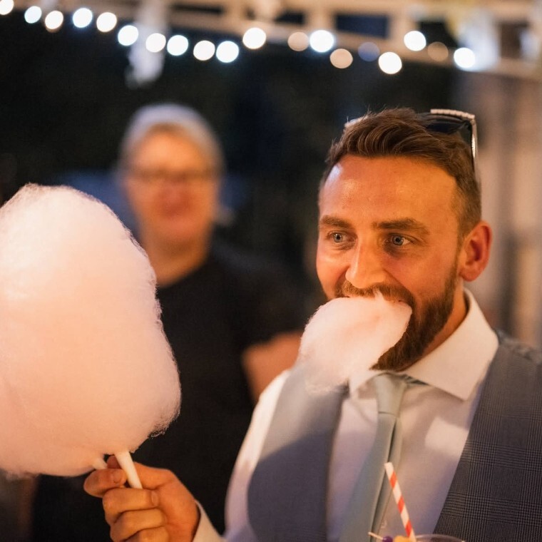 Groom enjoying Candy Floss
