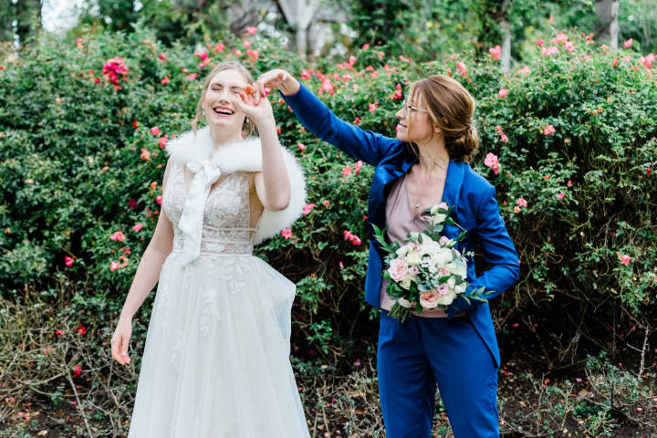 Brides dancing in gardens at Pembroke Lodge, Richmond Park