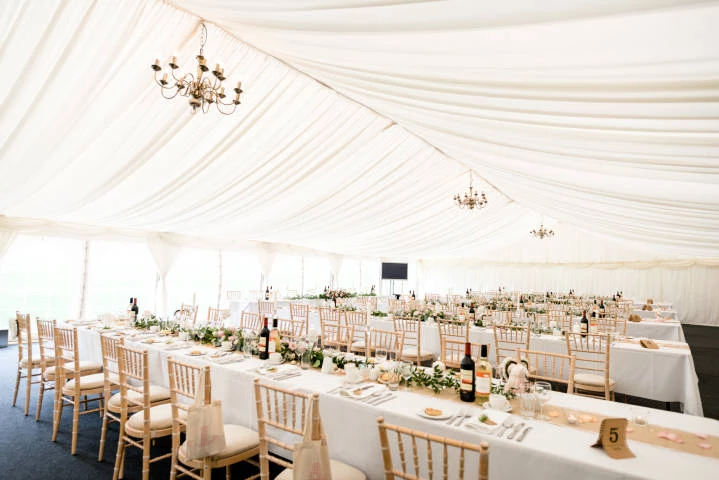 Banquet tables in the Marquee
