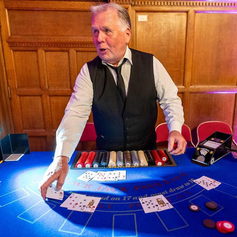 croupier at poker table provided by casinorama and Elite Events London