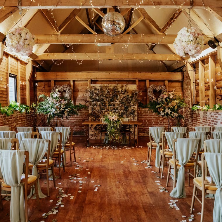 Wellington Barn set for a barn wedding ceremony