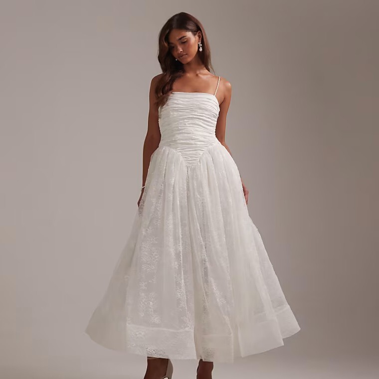 Model wearing Asos wedding drss
