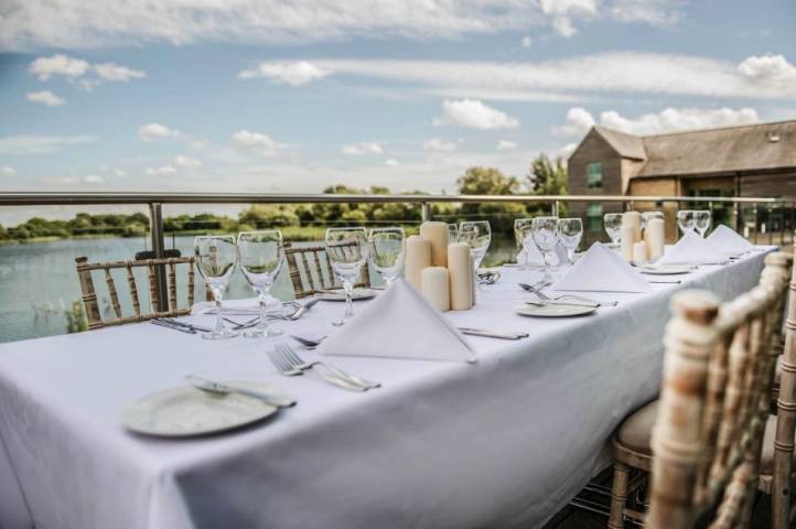 Outdoor dining overlooking the lake.