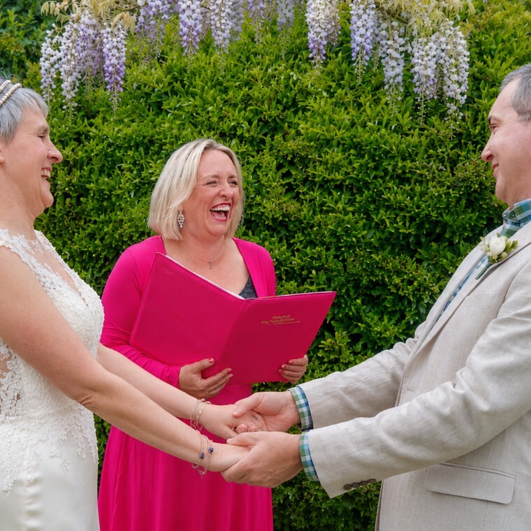 Rustic Outdoor Festival Wedding, showing the Pink Celebrant leading a ceremony