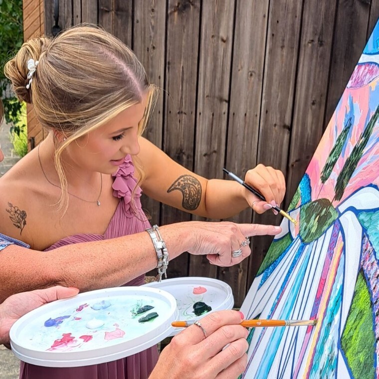 wedding guest painting on the wedding day