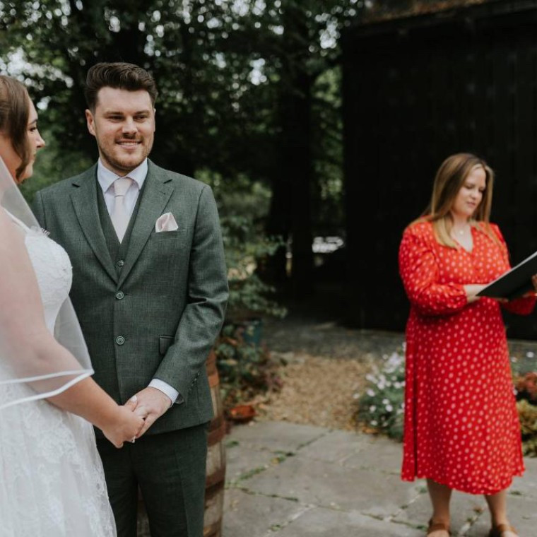 Emily Ayres conducting a wedding ceremony at  Nant Y Walch Barn, Powys