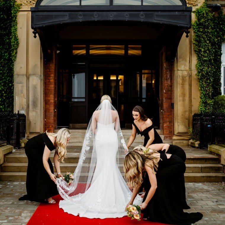 Bride in front of the Clifton Arms