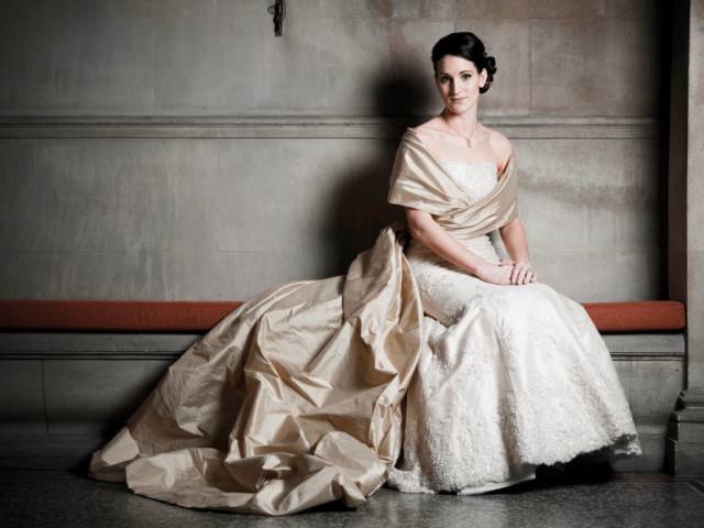 Bespoke lace wedding dress and coordinating bridal cape by Rachel Lamb Design, bridal designer in Cambridgeshire