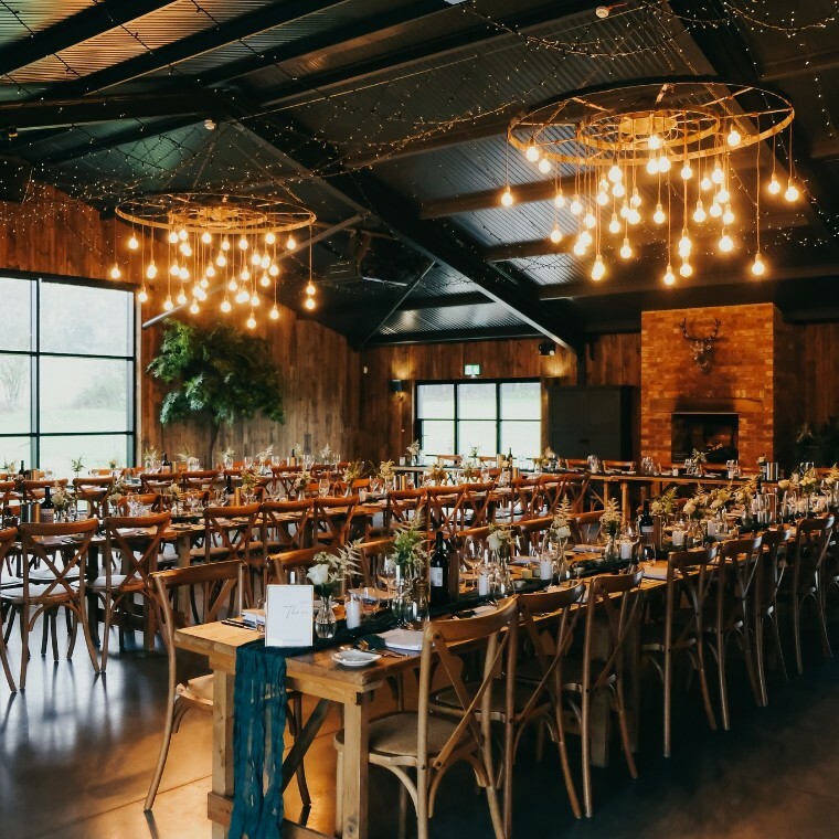 Interior wedding barn at Silchester Farm set for a wedding breakfast