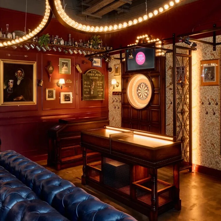 dartboard in a fairground themed bar