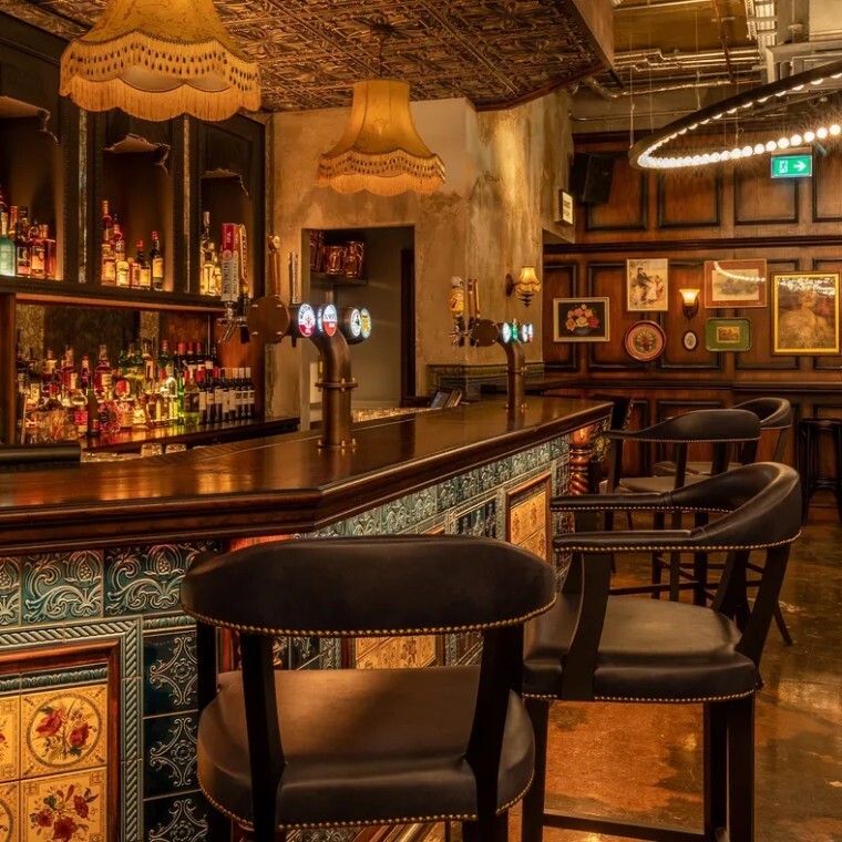 themed bar with wood and tile features