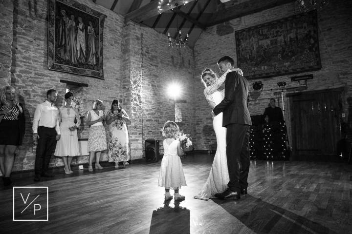 Special first dance with their flower girl. Wedding moments captured by Veiled Productions - fun wed