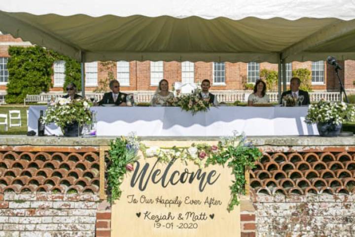 Welcome sign in front of the party table